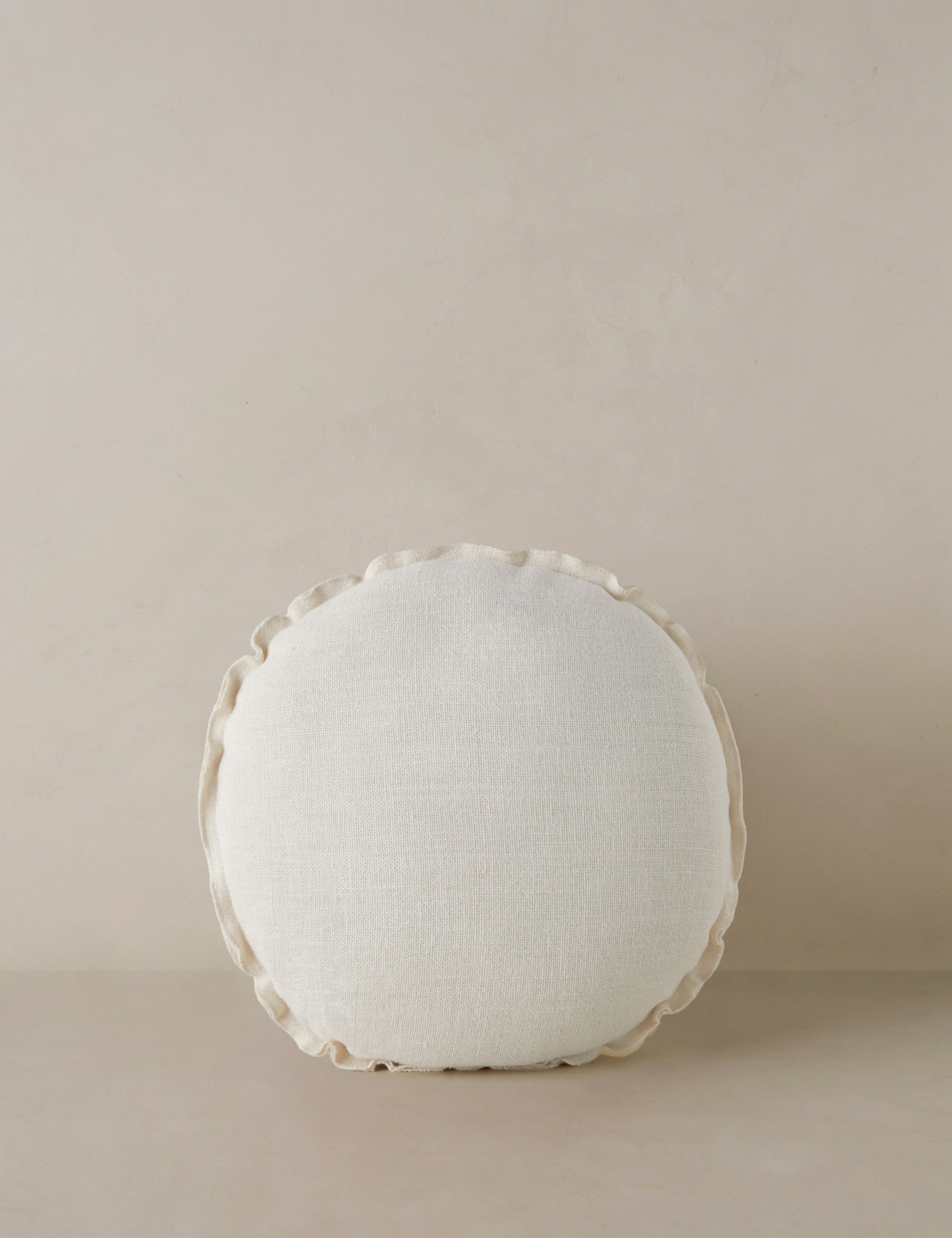 #color::ivory | Arlo linen flange trim round pillow.
