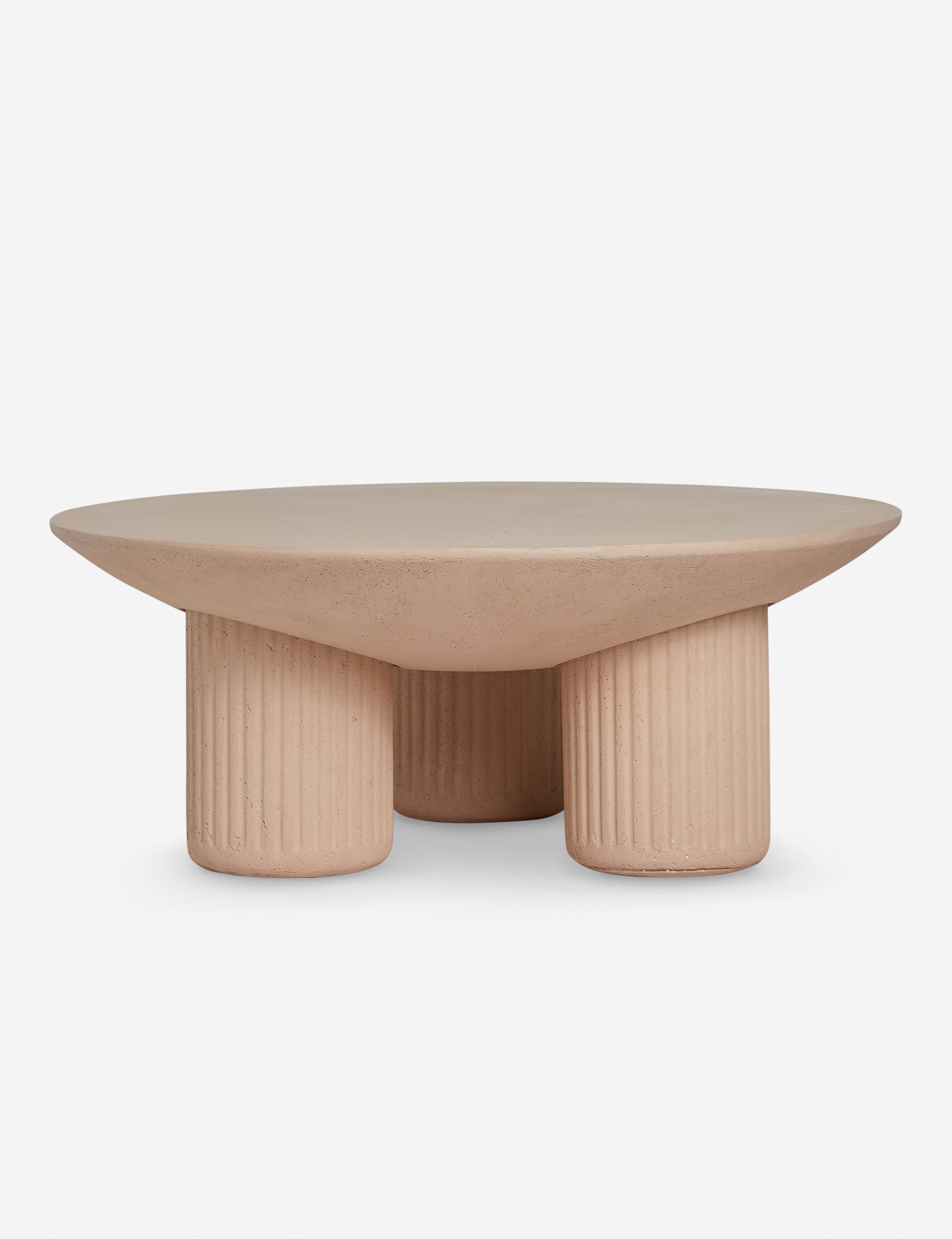 #color::terracotta | Carr modern round fluted base coffee table.